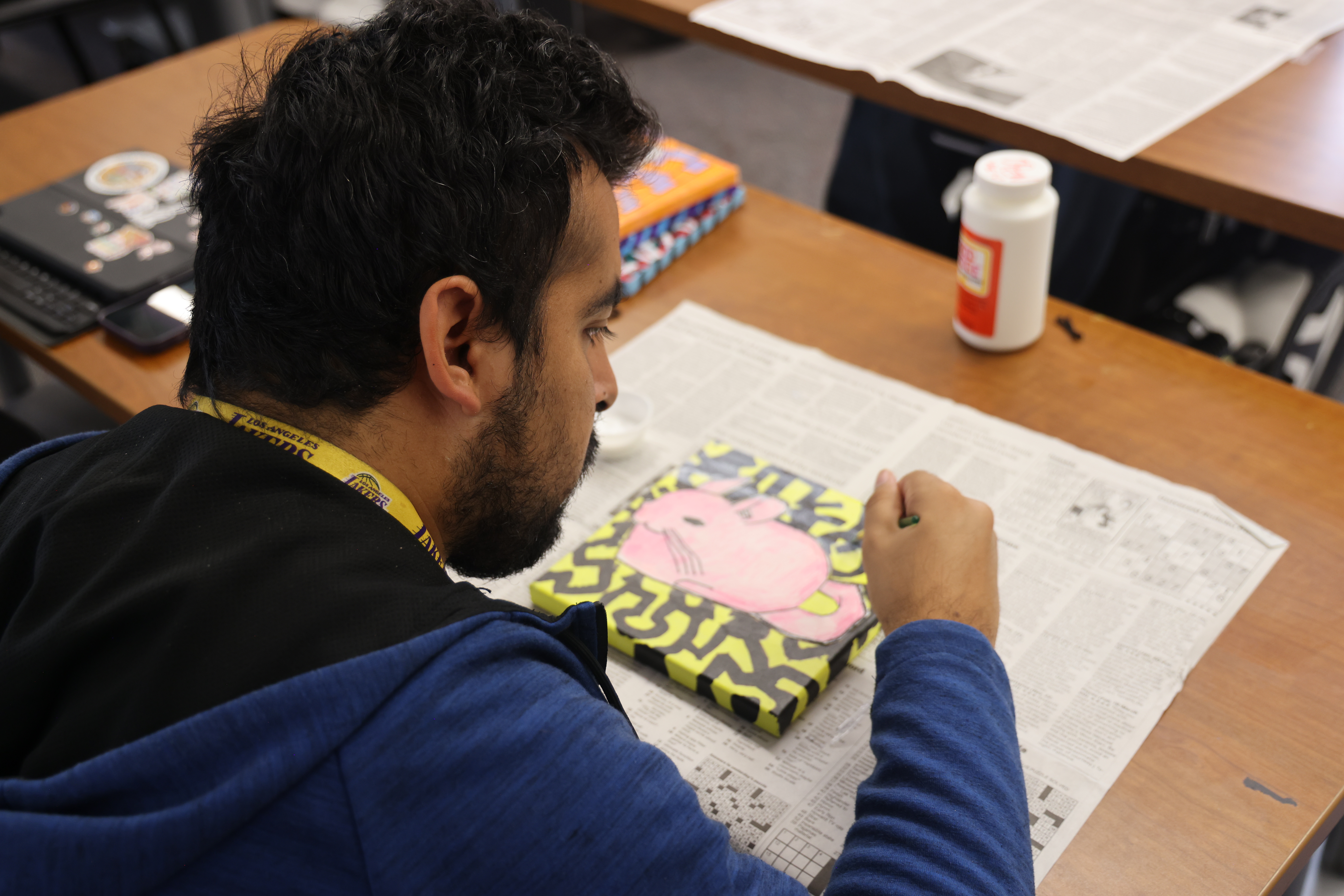 Student doing artwork